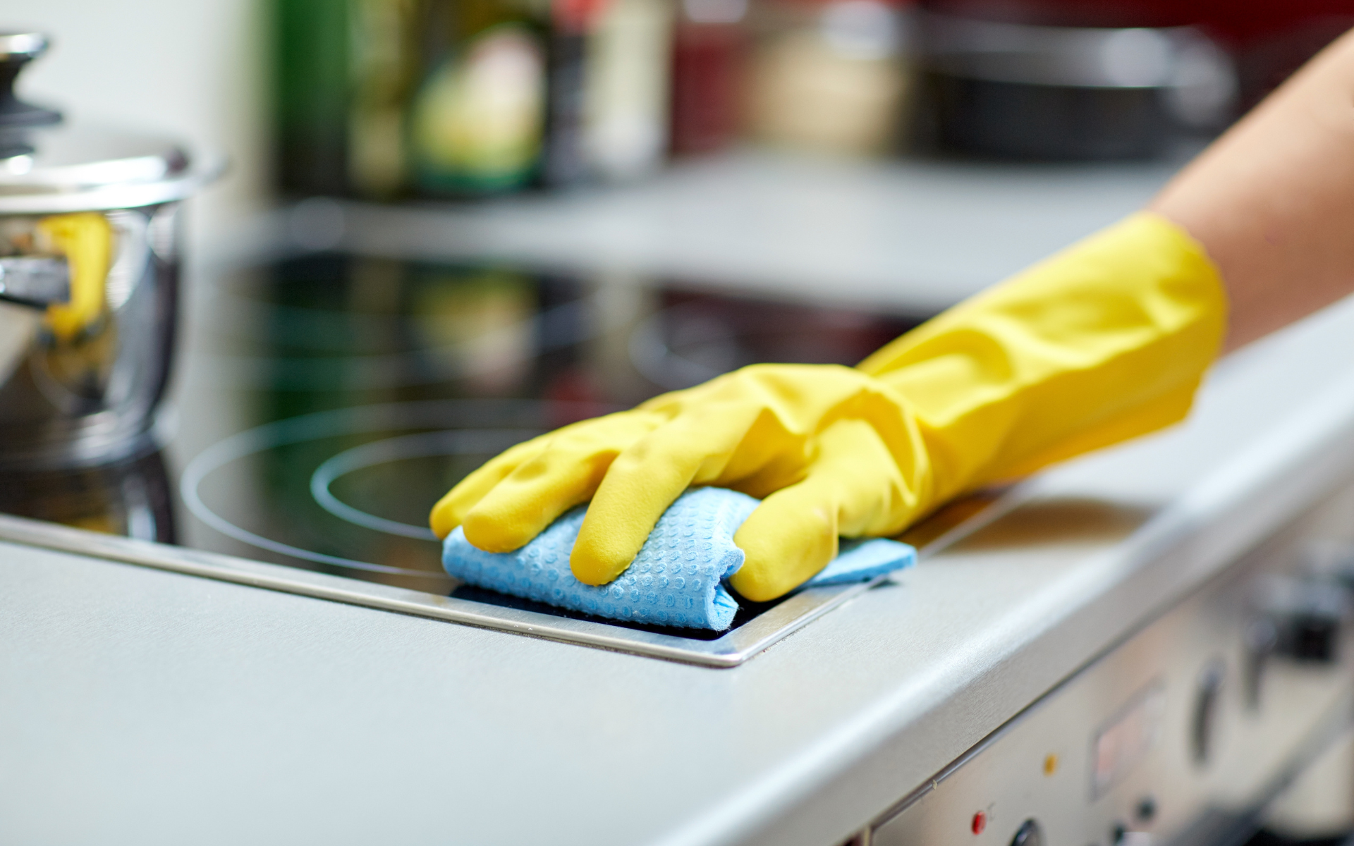 Wiping kitchen countertop with appliance